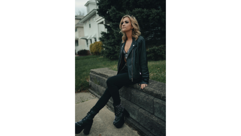 Faux leather jacket with skinny jeans winter street style look under 3000
